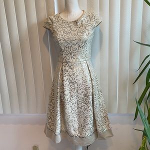 Once worn Calvin Klein lace and sequins short sleeves dress.